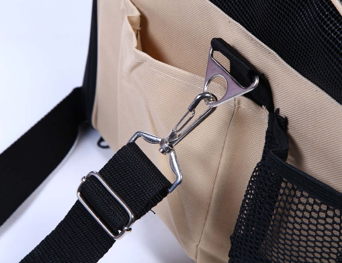FREDOPETS pet car bag features a secure clip and adjustable strap for safe travel with dogs and cats.